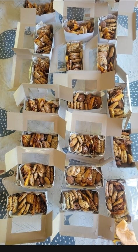 Gift boxes filled with assorted biscuits ready for an order