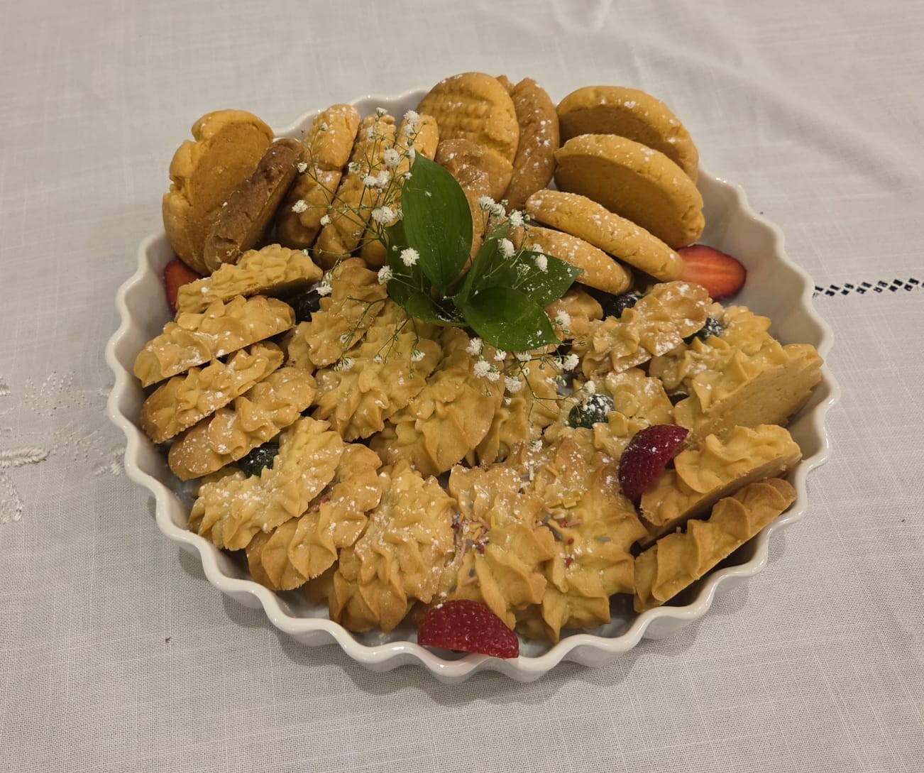 A platter of freshly baked biscuits garnished with flowers