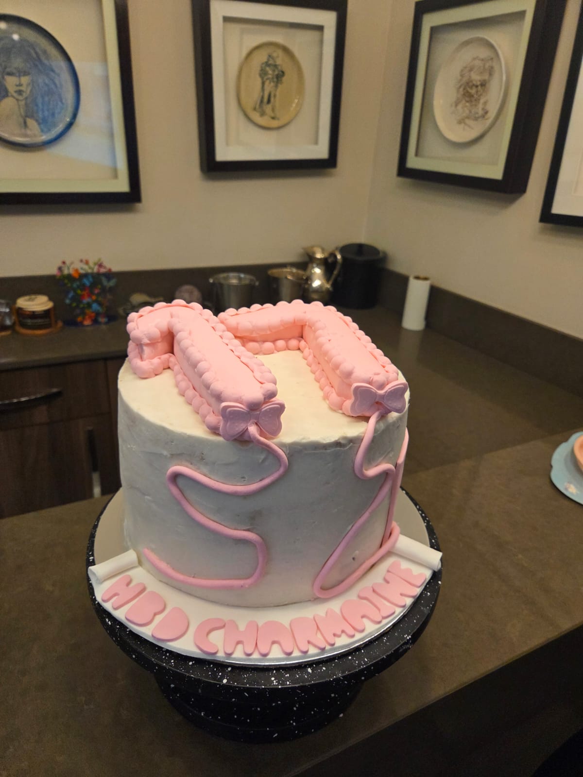 Pink and white fiftieth birthday cake