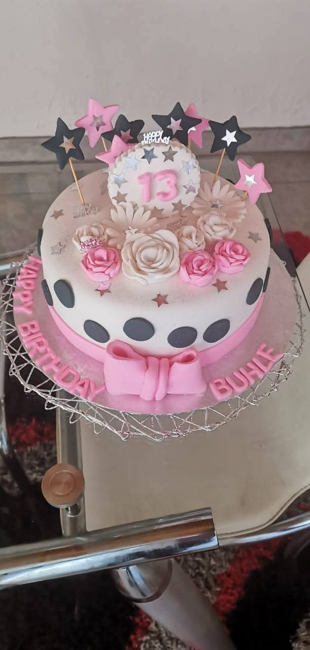 Fondant thirteenth birthday cake with stars and roses