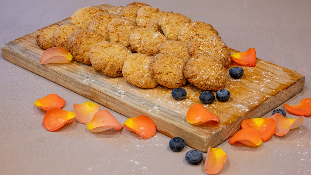Coconut biscuits on a wooden board