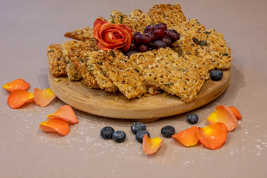 Seed and oat health crunchies on a wooden board